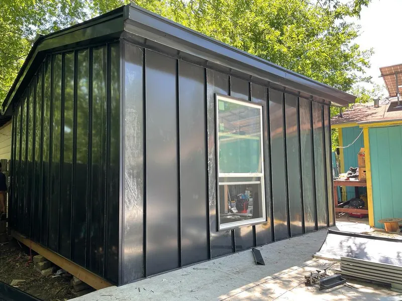 Black standing seam metal wall panels for Metal Roof Installation in Pryor Creek